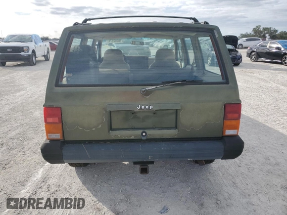 1996 Jeep Cherokee SE z VIN 1J4FJ28S9TL211073, wystawiony jako Copart lot #78052574 z przebiegiem 174 967 mil mil oraz Nie do naprawy • Non repairable. Historia ofert i sprzedaży dostępna na DreamBid. Obrazek 6.