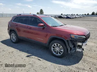 2019 Jeep Cherokee Latitude Plus with VIN 1C4PJMLXXKD250658, listed as a Copart auction lot 62199565 with 95,224 mi miles and Salvage title. Bid and sale history available at DreamBid. Image 4.