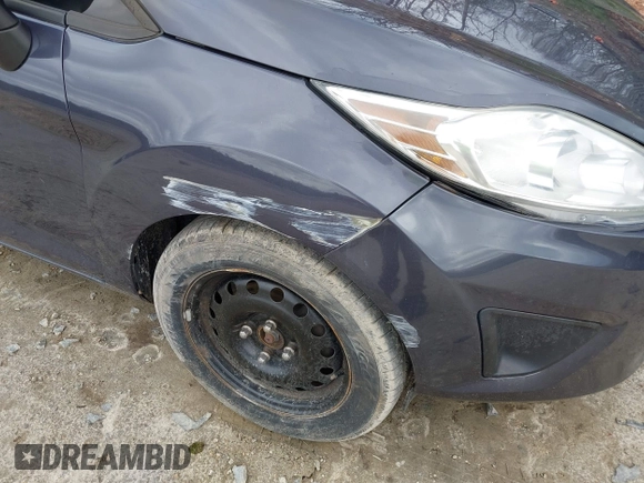 2012 Ford Fiesta SE with VIN 3FADP4BJ3CM152310, listed as a IAAI auction lot 42028398 with 124,530 mi miles and . Bid and sale history available at DreamBid. Image 6.