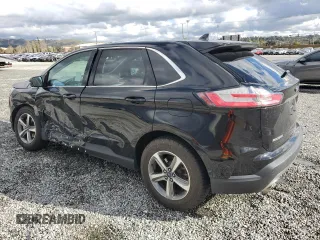 2019 Ford Edge SEL with VIN 2FMPK3J92KBC74322, listed as a Copart auction lot 48760065 with 62,949 mi miles and Salvage title. Bid and sale history available at DreamBid. Image 2.