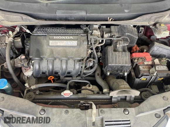 2010 Honda Insight LX with VIN JHMZE2H59AS032860, listed as a Copart auction lot 60861945 with 253,444 mi miles and Clean title. Bid and sale history available at DreamBid. Image 7.