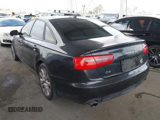 2014 Audi A6 Premium Plus z VIN WAUGFAFC7EN025053, wystawiony jako IAAI lot #42131033 z przebiegiem 154 552 mil mil oraz . Historia ofert i sprzedaży dostępna na DreamBid. Obrazek 3.