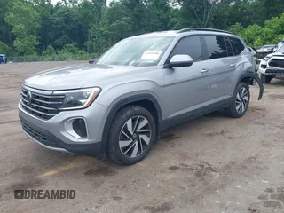 2024 Volkswagen Atlas SE with VIN 1V2WR2CA6RC574936, listed as a IAAI auction lot 42257308 with 23,370 mi miles and . Bid and sale history available at DreamBid. Image 2.