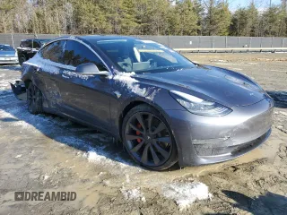 2020 Tesla Model 3 Performance z VIN 5YJ3E1ECXLF736151, wystawiony jako Copart lot #41789365 z przebiegiem 30 456 mil mil oraz Szkoda całkowita • Salvage title. Historia ofert i sprzedaży dostępna na DreamBid. Obrazek 4.
