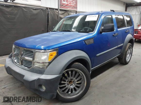 2007 Dodge Nitro SXT with VIN 1D8GT28K47W733488, listed as a IAAI auction lot 42021076 with 120,862 mi miles. Bid and sale history available at carsss.com. Image 18.