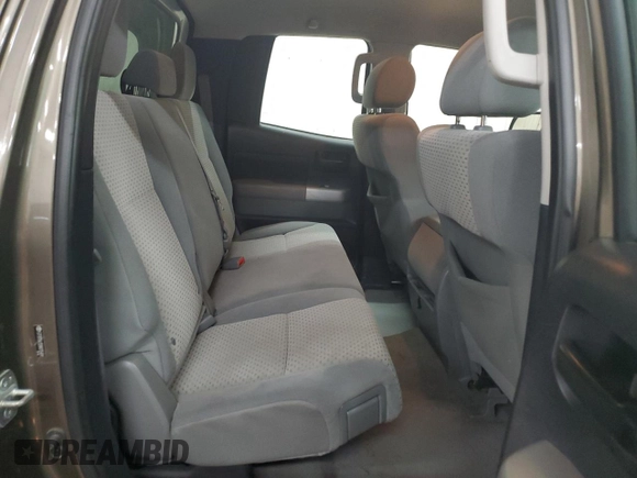 2009 Toyota Tundra z VIN 5TFBT54129X015491, wystawiony jako Copart lot #50884015 z przebiegiem 142 533 mil mil oraz Szkody całkowita. Historia ofert i sprzedaży dostępna na DreamBid. Obrazek 11.