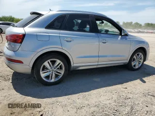 2018 Audi Q3 Premium z VIN WA1BCCFS3JR016890, wystawiony jako Copart lot #52594015 z przebiegiem 63 871 mil mil oraz Szkoda całkowita • Salvage title. Historia ofert i sprzedaży dostępna na DreamBid. Obrazek 3.