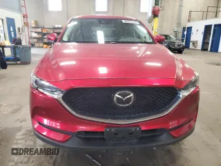 2020 Mazda CX-5 Grand Touring with VIN JM3KFBDM9L0760861, listed as a Copart auction lot 60977275 with 58,608 mi miles and Salvage title. Bid and sale history available at DreamBid. Image 5.