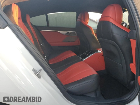 2023 BMW 8 Series M850i z VIN WBAGV8C0XPCL58173, wystawiony jako Copart lot #76322394 z przebiegiem 24 954 mil mil oraz Nie do naprawy • Non repairable. Historia ofert i sprzedaży dostępna na DreamBid. Obrazek 10.