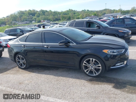 2017 Ford Fusion Titanium with VIN 3FA6P0K91HR257462, listed as a IAAI auction lot 42079361 with 124,914 mi miles and . Bid and sale history available at DreamBid. Image 13.