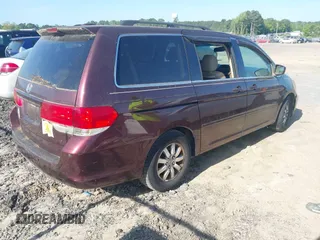 2009 Honda Odyssey EX-L with VIN 5FNRL38699B402476, listed as a IAAI auction lot 42146268 with 189,106 mi miles. Bid and sale history available at carsss.com. Image 4.