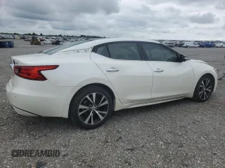 2016 Nissan Maxima Platinum with VIN 1N4AA6AP8GC406798, listed as a Copart auction lot 60143595 with 134,704 mi miles and Salvage title. Bid and sale history available at DreamBid. Image 3.