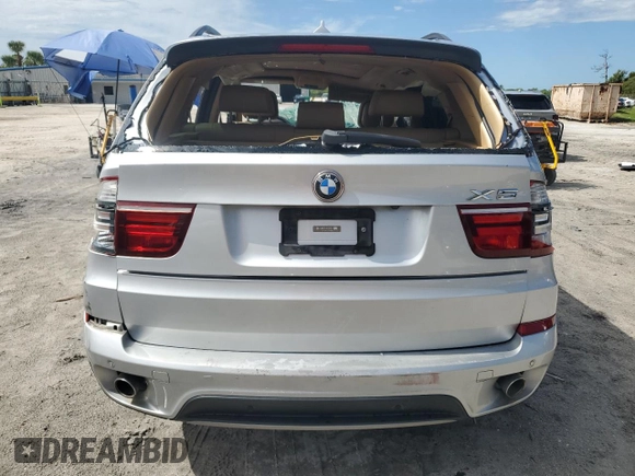 2012 BMW X5 35d with VIN 5UXZW0C51CL668064, listed as a Copart auction lot 62217845 with 140,544 mi miles and Salvage title. Bid and sale history available at DreamBid. Image 6.