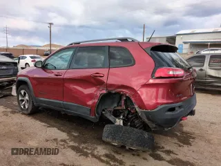 2015 Jeep Cherokee Trailhawk z VIN 1C4PJMBSXFW649425, wystawiony jako Copart lot #52900735 z przebiegiem 89 345 mil mil oraz Szkoda całkowita • Salvage title. Historia ofert i sprzedaży dostępna na DreamBid. Obrazek 14.