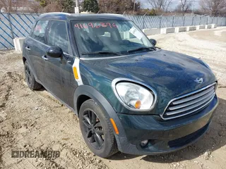 2013 MINI Cooper Countryman with VIN WMWZB3C58DWM09440, listed as a IAAI auction lot 41696396 with 52,930 mi miles. Bid and sale history available at carsss.com. Image 1.