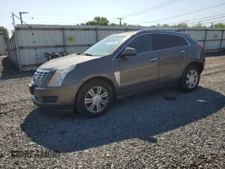 2016 Cadillac SRX Luxury Collection with VIN 3GYFNEE32GS559459, listed as a Copart auction lot 62274405 with 125,596 mi miles and Salvage title. Bid and sale history available at DreamBid. Image 1.