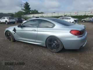 2014 BMW M6 z VIN WBSLX9C53ED160340, wystawiony jako Copart lot #68315924 z przebiegiem 95 899 mil mil oraz Czysty tytuł • Clean title. Historia ofert i sprzedaży dostępna na DreamBid. Obrazek 2.
