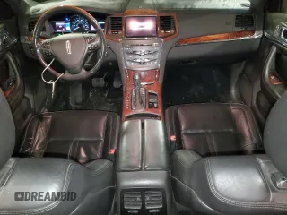2013 Lincoln MKS with VIN 1LNHL9DK6DG606079, listed as a Copart auction lot 87322174 with 133,383 mi miles and Salvage Title. Bid and sale history available at DreamBid. Image 8.