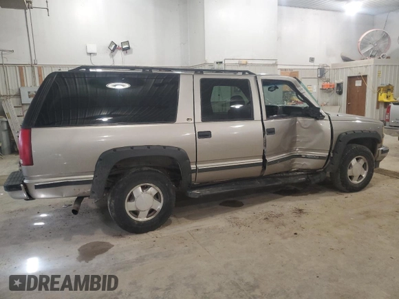 1999 Chevrolet Suburban z VIN 3GNFK16R4XG250550, wystawiony jako Copart lot #51941515 z przebiegiem 202 667 mil mil oraz Szkoda całkowita • Salvage title. Historia ofert i sprzedaży dostępna na DreamBid. Obrazek 3.