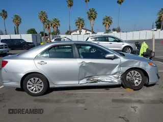 2014 Toyota Camry L with VIN 4T4BF1FK5ER442960, listed as a IAAI auction lot 42206639 with 119,639 mi miles and . Bid and sale history available at DreamBid. Image 13.
