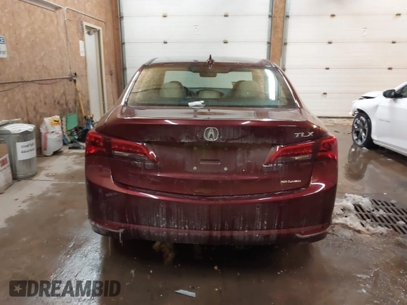 2015 Acura TLX Advance z VIN 19UUB3F70FA010680, wystawiony jako IAAI lot #41609571 z przebiegiem 123 004 mil mil oraz . Historia ofert i sprzedaży dostępna na DreamBid. Obrazek 16.
