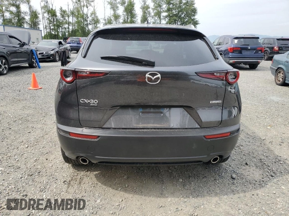 2020 Mazda CX-30 Premium с VIN 3MVDMBEM3LM108741, выставлен на аукционе Copart как лот 62100745 с пробегом 16 307 миль миль и Списание • Salvage title. История ставок и продаж доступна на DreamBid. Изображение 6.