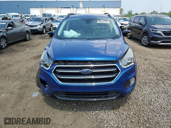 2019 Ford Escape Titanium z VIN 1FMCU9J99KUB39487, wystawiony jako Copart lot #60424765 z przebiegiem 43 094 mil mil oraz Szkoda całkowita • Salvage title. Historia ofert i sprzedaży dostępna na DreamBid. Obrazek 5.