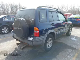 2004 Chevrolet Tracker ZR2 z VIN 2CNBJ734746917149, wystawiony jako IAAI lot #41649562 z przebiegiem 216 092 mil mil oraz . Historia ofert i sprzedaży dostępna na DreamBid. Obrazek 4.