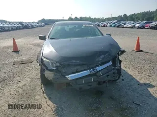 2012 Ford Fusion SE z VIN 3FAHP0HA9CR273430, wystawiony jako Copart lot #62766575 z przebiegiem 212 399 mil mil oraz Szkoda całkowita • Salvage title. Historia ofert i sprzedaży dostępna na DreamBid. Obrazek 10.