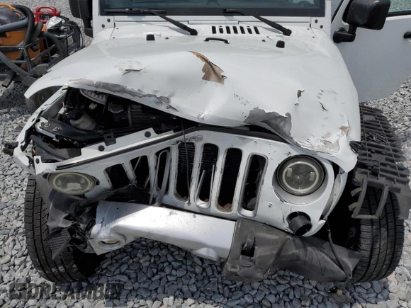 2018 Jeep Wrangler Unlimited Sahara z VIN 1C4BJWEGXJL838339, wystawiony jako Copart lot #54161375 z przebiegiem 70 556 mil mil oraz Szkoda całkowita • Salvage title. Historia ofert i sprzedaży dostępna na DreamBid. Obrazek 11.