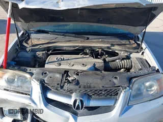 2004 Acura MDX Touring Pkg w/Navigation with VIN 2HNYD18804H546977, listed as a IAAI auction lot 41345964 with 161,856 mi miles. Bid and sale history available at carsss.com. Image 10.