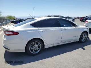 2016 Ford Fusion SE Hybrid с VIN 3FA6P0LU4GR259692, выставлен на аукционе Copart как лот 57100415 с пробегом 154 051 миль миль и Списание • Salvage title. История ставок и продаж доступна на DreamBid. Изображение 3.
