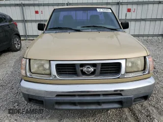 1999 Nissan Frontier XE with VIN 1N6DD21S9XC312809, listed as a Copart auction lot 57702005 with 174,183 mi miles and Clean title. Bid and sale history available at DreamBid. Image 5.