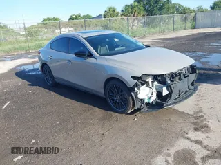 2022 Mazda 3 Premium Plus with VIN 3MZBPBEY4NM300365, listed as a IAAI auction lot 42720165 with 40,777 mi miles and . Bid and sale history available at DreamBid. Image 1.