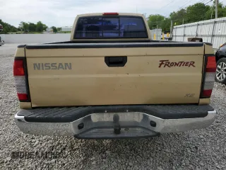 1999 Nissan Frontier XE with VIN 1N6DD21S9XC312809, listed as a Copart auction lot 57702005 with 174,183 mi miles and Clean title. Bid and sale history available at DreamBid. Image 6.