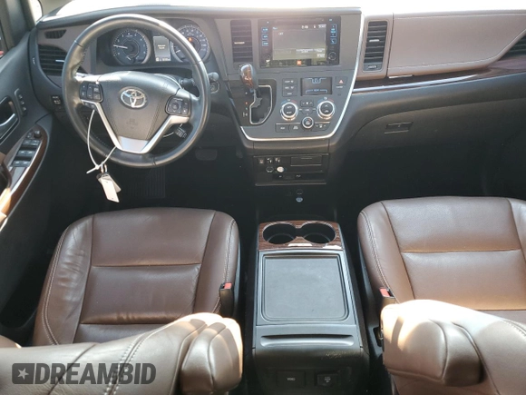 2017 Toyota Sienna XLE with VIN 5TDDZ3DC0HS164600, listed as a Copart auction lot 64262685 with 82,353 mi miles and Salvage title. Bid and sale history available at DreamBid. Image 8.