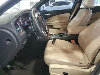 2012 Dodge Charger SE with VIN 2C3CDXBG1CH146027, listed as a Copart auction lot 55129565 with 219,879 mi miles and Salvage Title. Bid and sale history available at DreamBid. Image 7.