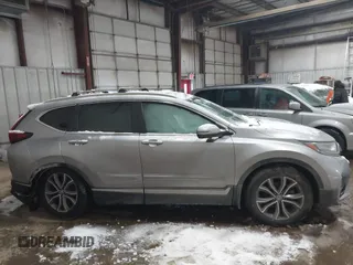 2020 Honda CR-V Touring with VIN 7FARW2H96LE000275, listed as a IAAI auction lot 41600759 with 78,078 mi miles and . Bid and sale history available at DreamBid. Image 13.