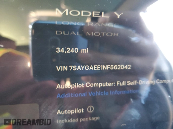 2022 Tesla Model Y Long Range with VIN 7SAYGAEE1NF562042, listed as a Copart auction lot 45702845 with 34,240 mi miles and Salvage Title. Bid and sale history available at carsss.com. Image 9.
