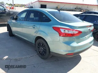 2012 Ford Focus SE with VIN 1FAHP3F20CL356322, listed as a IAAI auction lot 42088397 with 130,600 mi miles. Bid and sale history available at carsss.com. Image 3.