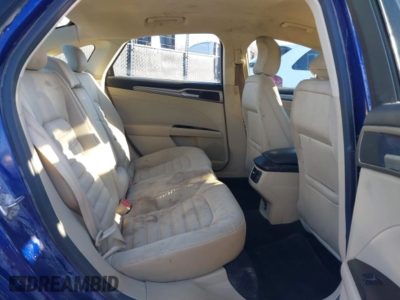 2016 Ford Fusion SE Hybrid with VIN 3FA6P0LU0GR388187, listed as a IAAI auction lot 38604646 with 135,625 mi miles. Bid and sale history available at carsss.com. Image 8.