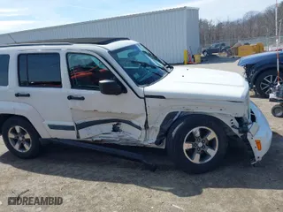 2008 Jeep Liberty Sport with VIN 1J8GN28K98W175737, listed as a IAAI auction lot 41904647 with 201,365 mi miles. Bid and sale history available at carsss.com. Image 6.