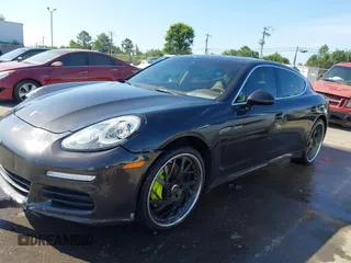 2014 Porsche Panamera S E-Hybrid with VIN WP0AD2A76EL044591, listed as a IAAI auction lot 42436817 with 89,009 mi miles and . Bid and sale history available at DreamBid. Image 14.