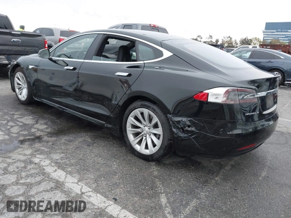 2016 Tesla Model S 70 with VIN 5YJSA1E1XGF154577, listed as a IAAI auction lot 41778697 with 62,630 mi miles and . Bid and sale history available at DreamBid. Image 3.