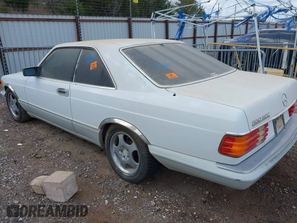 1990 Mercedes-Benz 560 with VIN WDBCA45E9LA549067, listed as a IAAI auction lot 41849642 with 124,516 mi miles and . Bid and sale history available at DreamBid. Image 3.