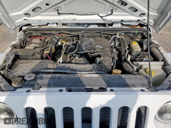 2015 Jeep Wrangler Unlimited Sport with VIN 1C4BJWDG9FL759012, listed as a Copart auction lot 61002465 with 101,395 mi miles and Salvage title. Bid and sale history available at DreamBid. Image 12.