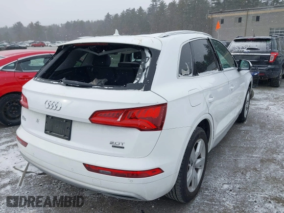 2018 Audi Q5 Premium Plus z VIN WA1BNAFY4J2221775, wystawiony jako IAAI lot #41263161 z przebiegiem 80 892 mil mil oraz . Historia ofert i sprzedaży dostępna na DreamBid. Obrazek 4.