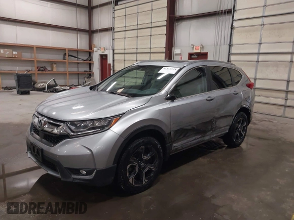 2017 Honda CR-V Touring with VIN 2HKRW2H90HH603307, listed as a IAAI auction lot 41868564 with 81,144 mi miles. Bid and sale history available at carsss.com. Image 19.