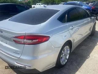 2019 Ford Fusion Hybrid SE with VIN 3FA6P0LU7KR241731, listed as a Copart auction lot 49031303 with 73,210 mi miles. Bid and sale history available at carsss.com. Image 4.