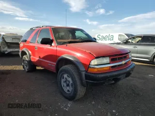 2004 Chevrolet Blazer LS z VIN 1GNCT18X34K141674, wystawiony jako Copart lot #85500954 z przebiegiem Nie podano mil oraz Czysty tytuł • Clean title. Historia ofert i sprzedaży dostępna na DreamBid. Obrazek 4.
